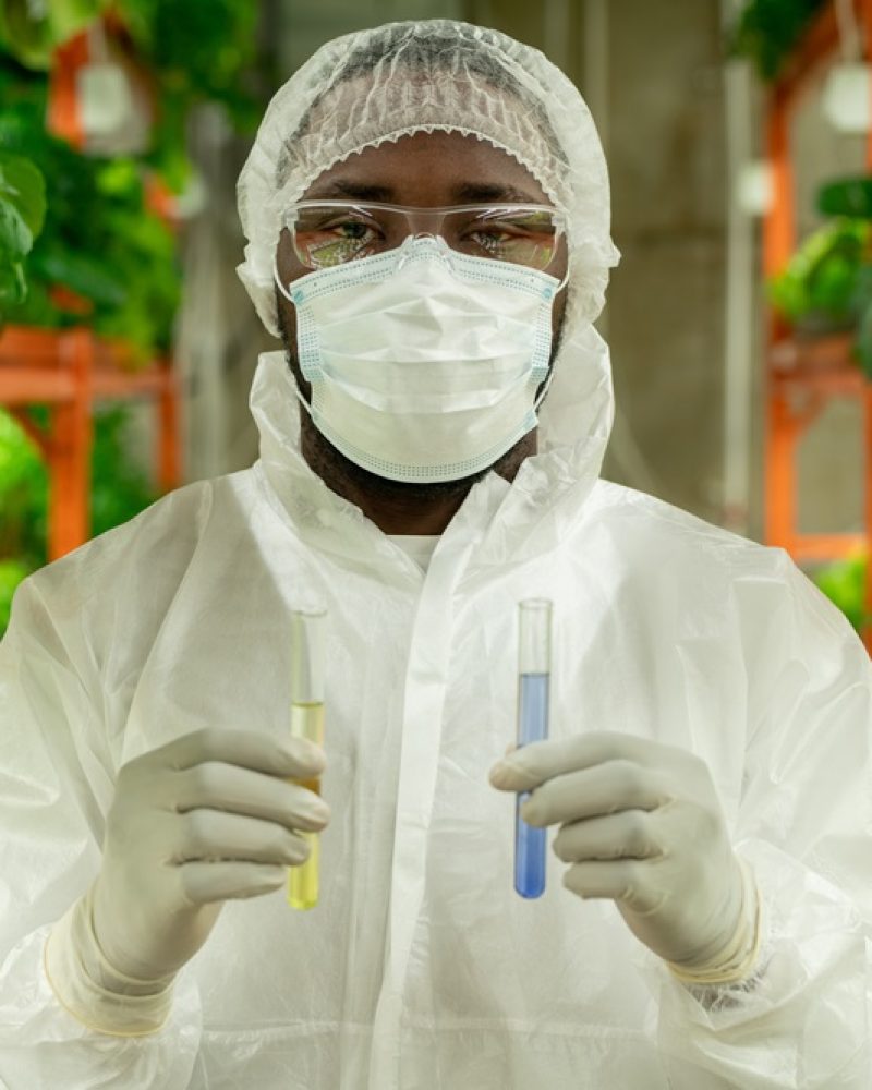african-american-cultivation-worker-with-test-tube-PDPKJ83.jpg